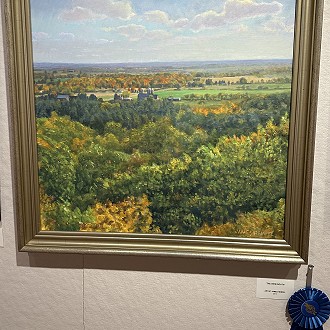Best of Show: “The View South” by James Hempel. This painting needed to be awarded the top prize because it’s just plain beautiful! The panoramic quality and the subtle color and values changes as the painting moves back in space are done to perfection. You can really feel the atmosphere of the day. Excellent work!