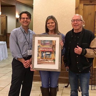 A Happy Art Patron in Sheboygan Falls.  Painting by Artist Evie Grasse