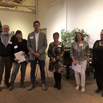 First Place - “In The Middle” Clay & Forged Iron by Sylvia & Mark Mondloch “There is a primeval, primitive, definitely prehistoric quality to this exciting turtle shell shaped shield piece. Everything design-wise truly does emanate from ‘the Middle’. I particularly like how the weighty, textured and twisted snaking of forged metal exquisitely cradles the smooth clay.”