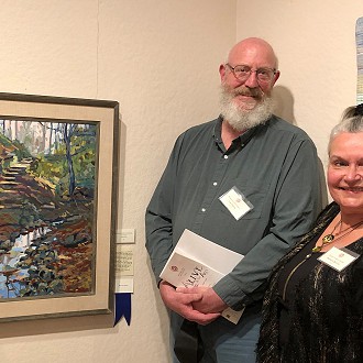 Best of Show -“Kaleidoscope Afternoon” Oil on Canvas by Tom Smith “I was compelled to come back, over and over again, and linger each and every time with the fragmented and jewel-like color, with bold, bravura brushwork throughout. One feels the wonder of each of earth’s eco-elements here – the Water welcoming one in, the Earth forms of rocks, trees, sloping ground, the sun as Fire in the sunny sky, and Wind rustling the leaves and guiding my Walk in these Wonderful Woods. Bravo and Congratulations!!!