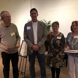 Merit Award “Spring Sun at Zion” Photograph by William Brusky “With a substantial presence and inviting composition, the stage was set for the powerful punch of raw red color, that delightfully frames the delicacy of lacy, silvery tree branches. Saturated color and contrasting textures kept me coming back for more.”