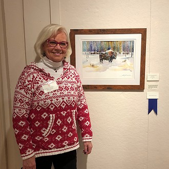 Second Place to Award Evie Grasse for “After the Roundup” watercolor. Judge Patrick’s Comment: This watercolor nicely captures the atmosphere and solitude of winter as the background animals graze against an abstract rainbow-like woods.