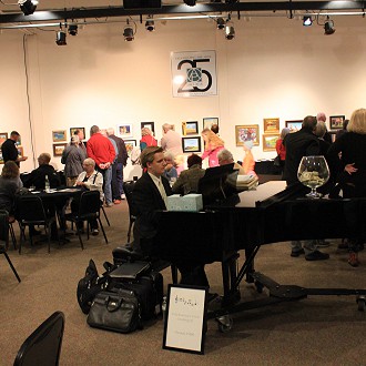 Musician Thomas Pibal provided beautiful music for this year’s Paint the Towns event.