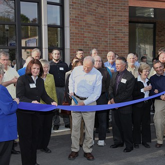 2012 Ribbon Cutting President Tom Slater and Executive Director Donna Hahn with the Sheboygan County Chamber of Commerce