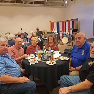 Photo Courtesy of Konrad Kaczkowski, a Table of Veterans