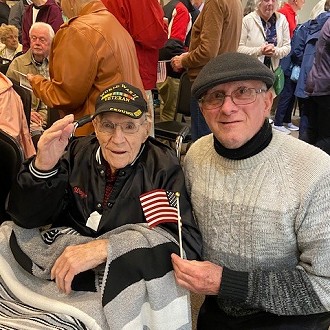 Wayne Perry 105 years at the Radio Rosies show with Ken Wilhite, a Marine Veteran